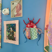 Workshop upcycle scrappy beetle bug wall hanging
