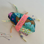 Workshop upcycle scrappy beetle bug wall hanging