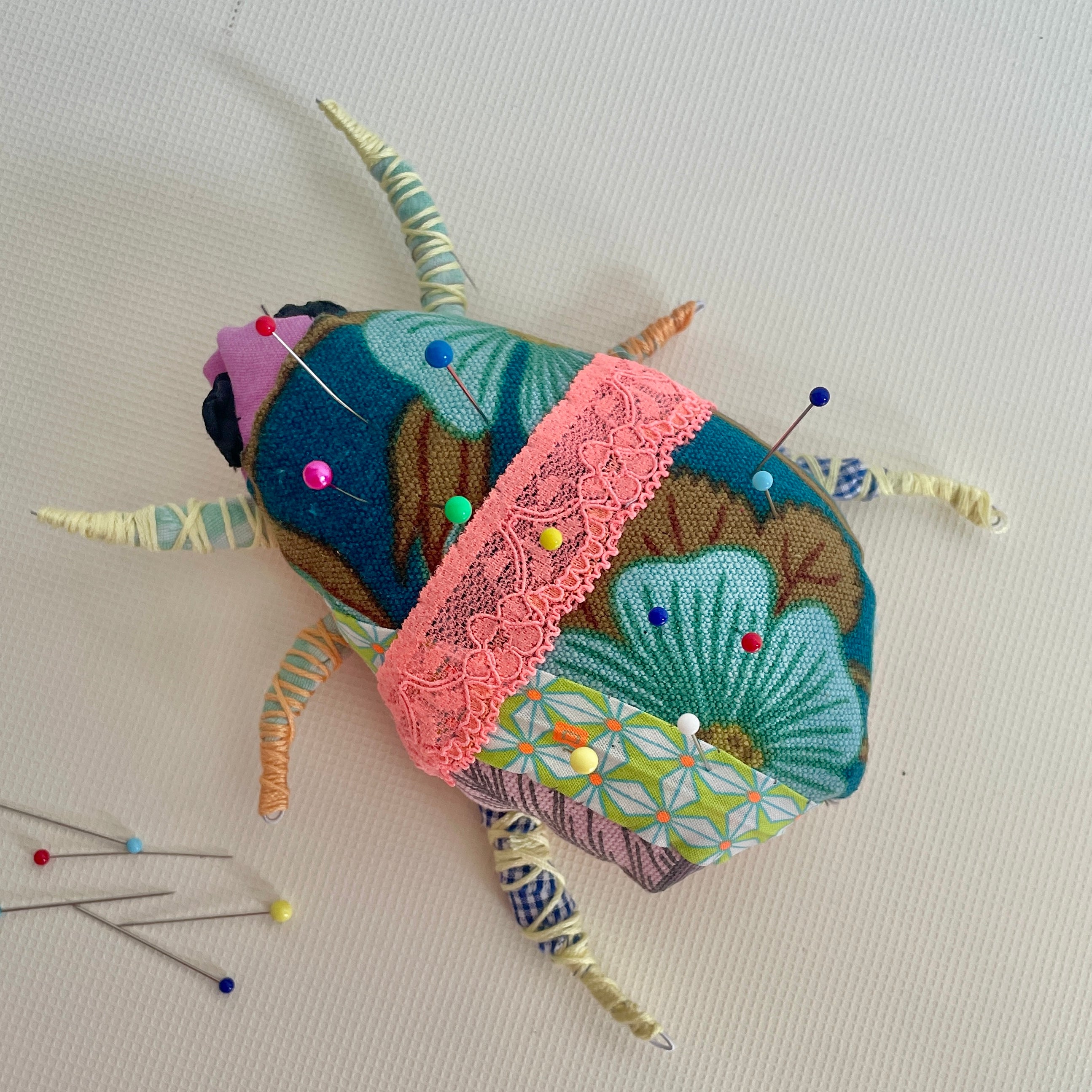 Workshop upcycle scrappy beetle bug wall hanging