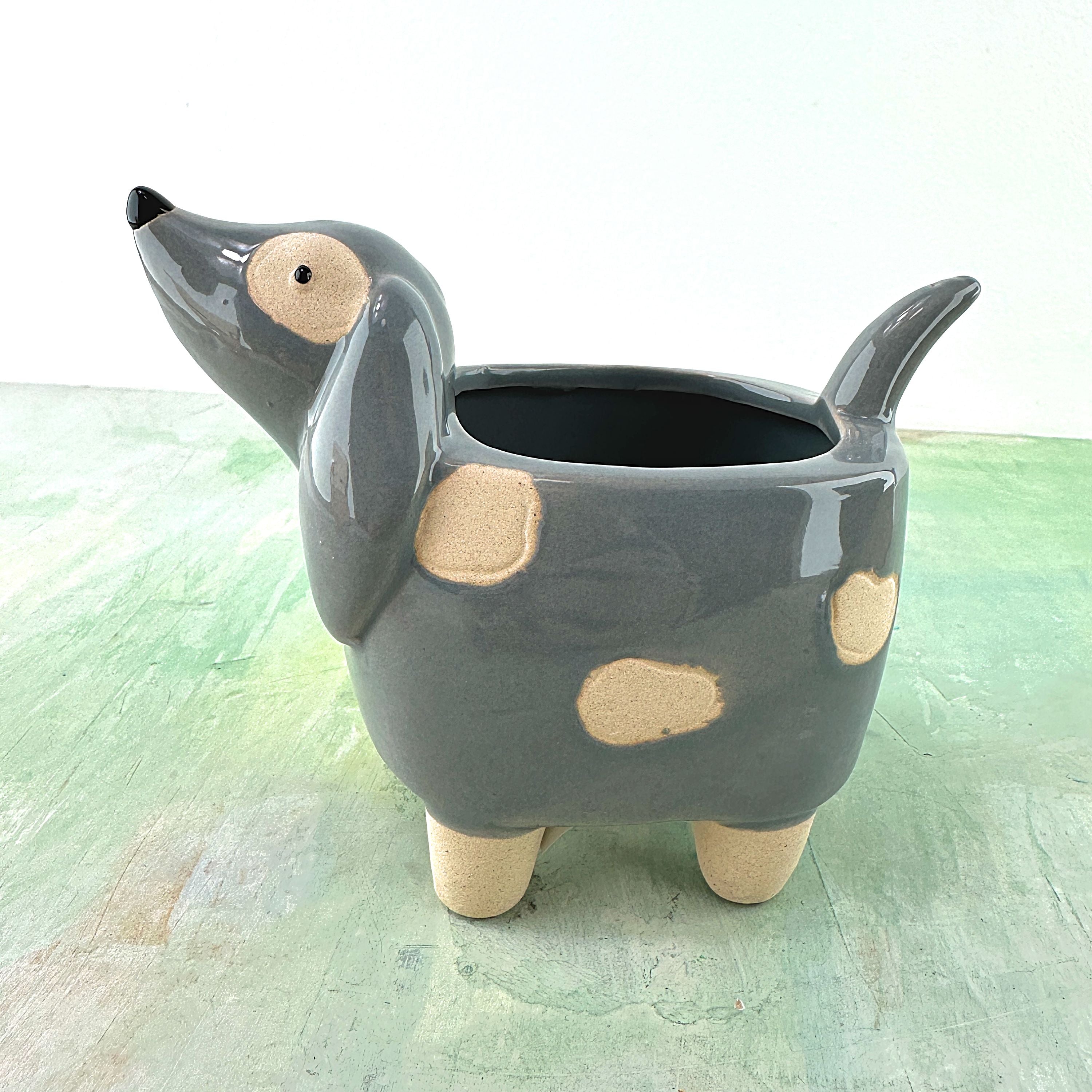 Grey spotty ceramic dog
