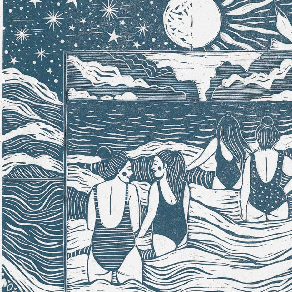 Framed artwork of three women in swimsuits by a body of water with celestial elements.