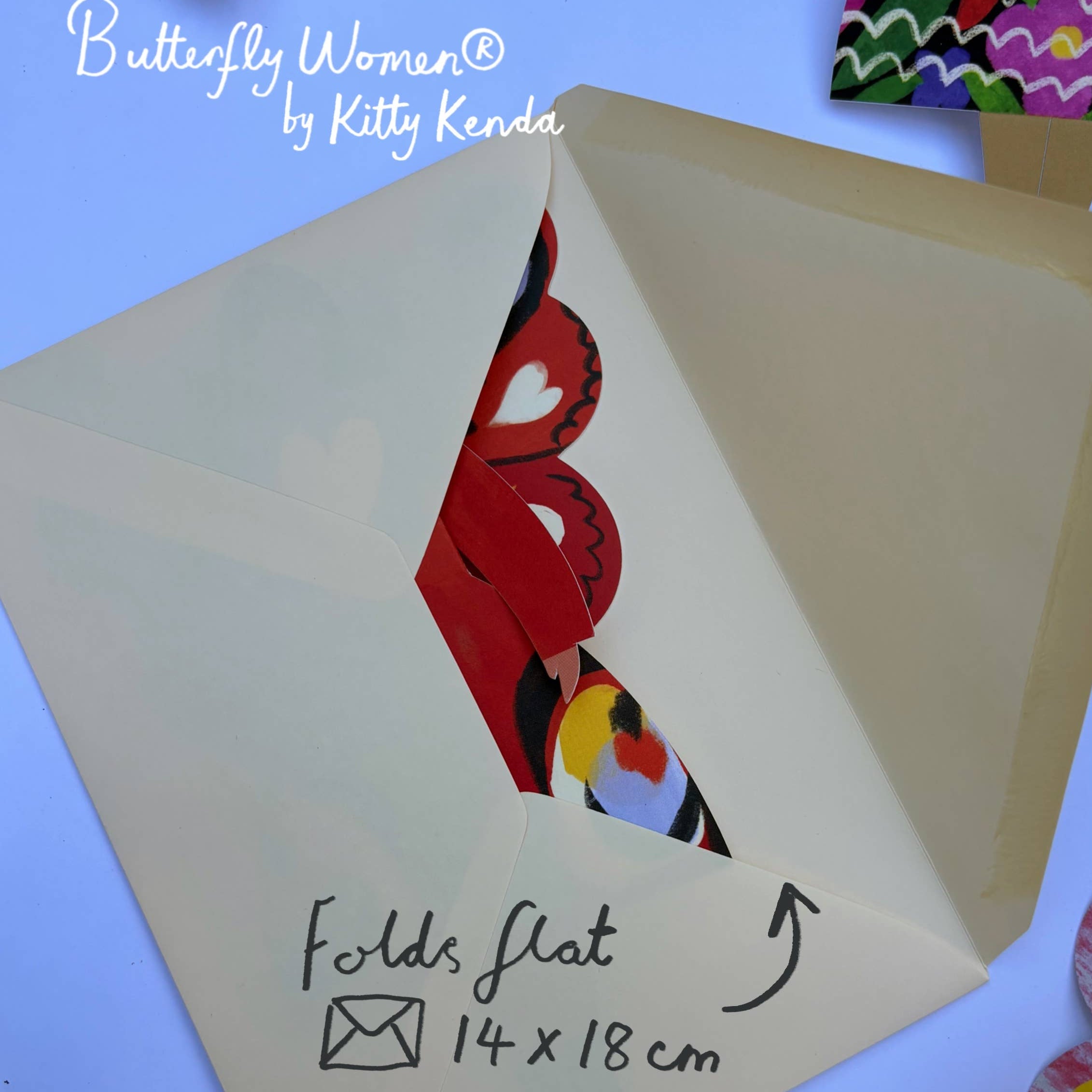 Card with butterfly design and folding instructions on a colorful background