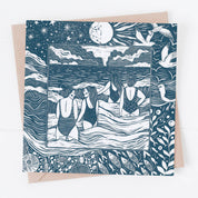 Greeting card with blue illustration of people by the sea on a white background