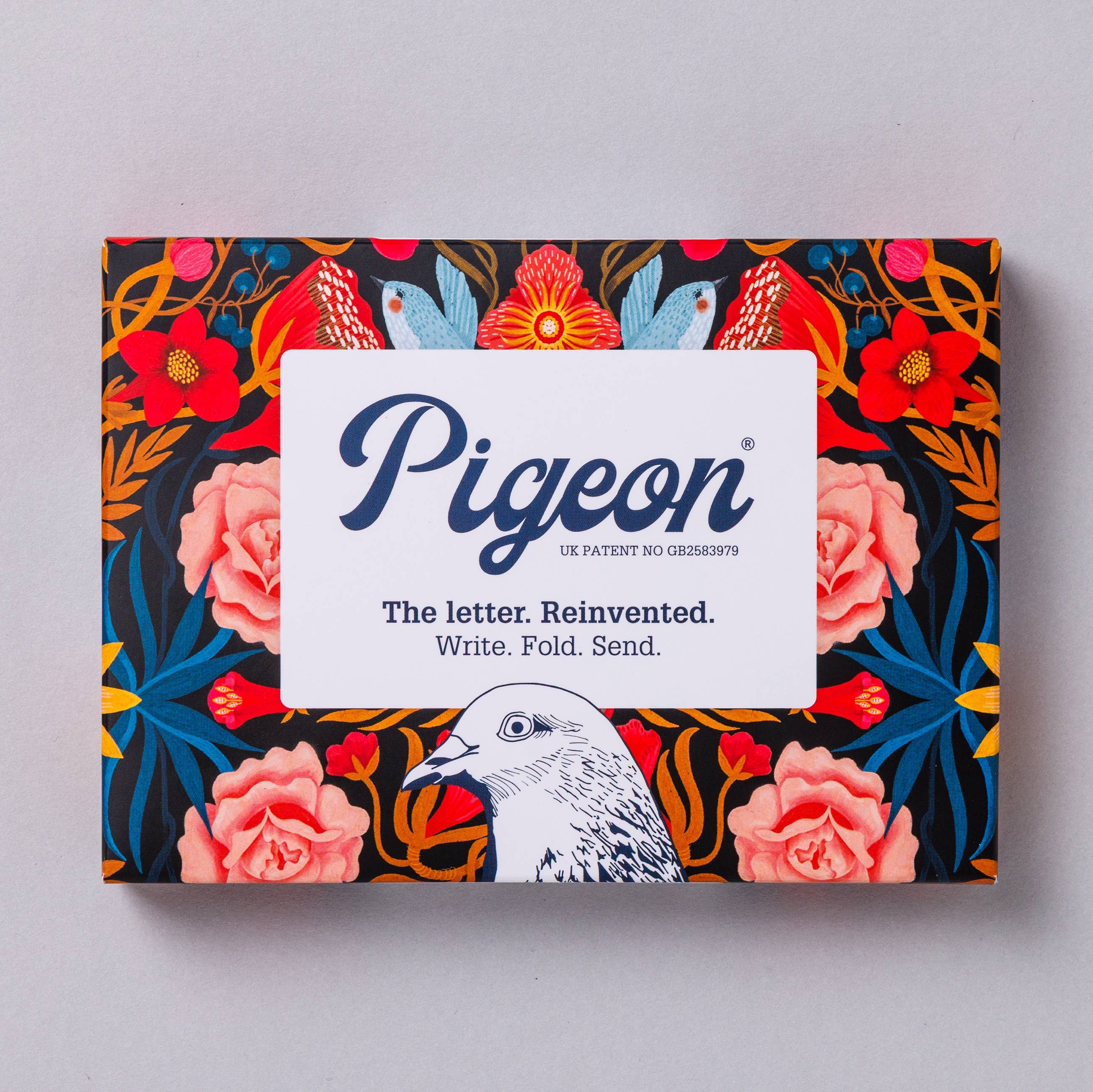 Pigeon product packaging with floral design and brand name on a gray background