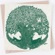 Greeting card with green tree and deer illustration on a white background