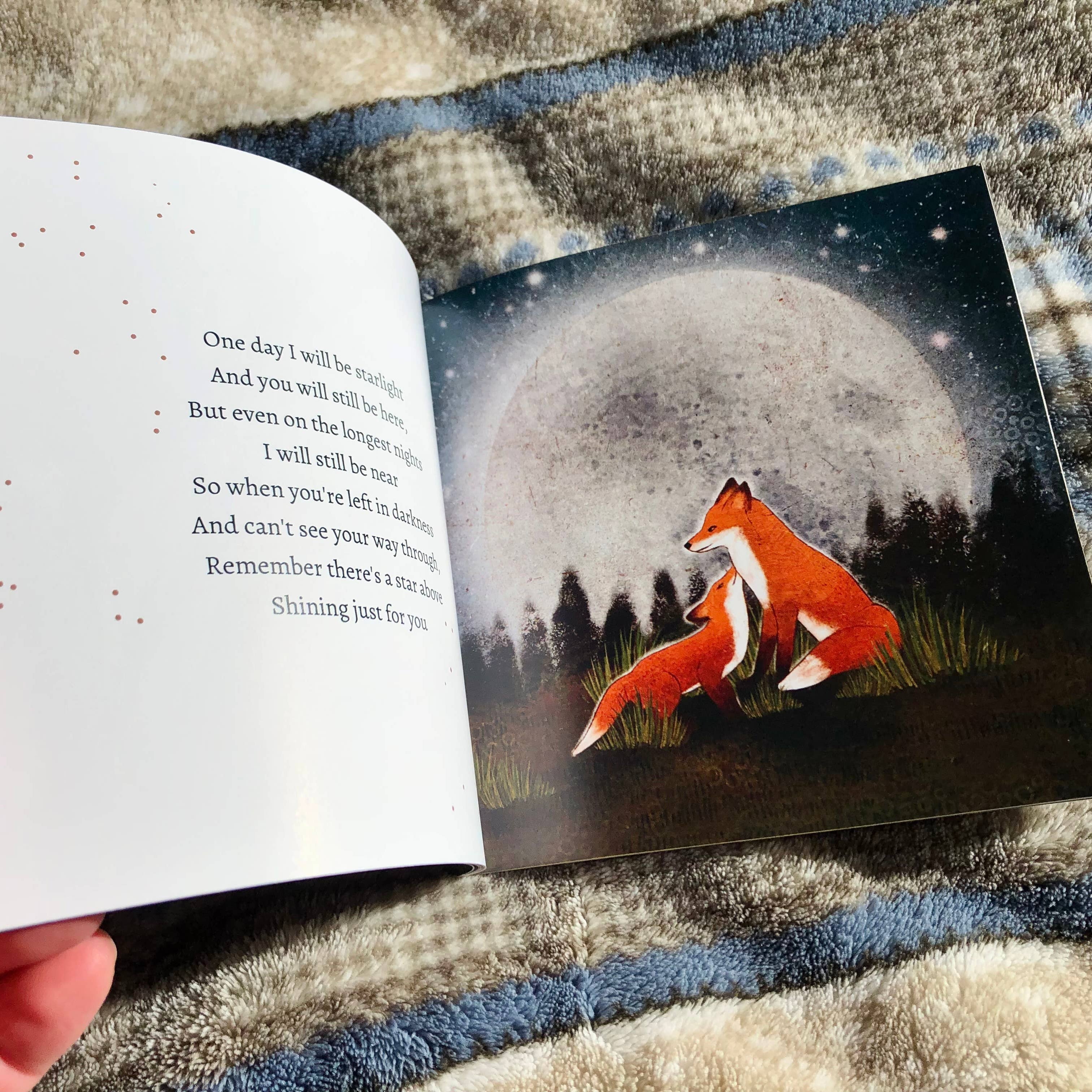 Open book with a fox illustration on a textured fabric background