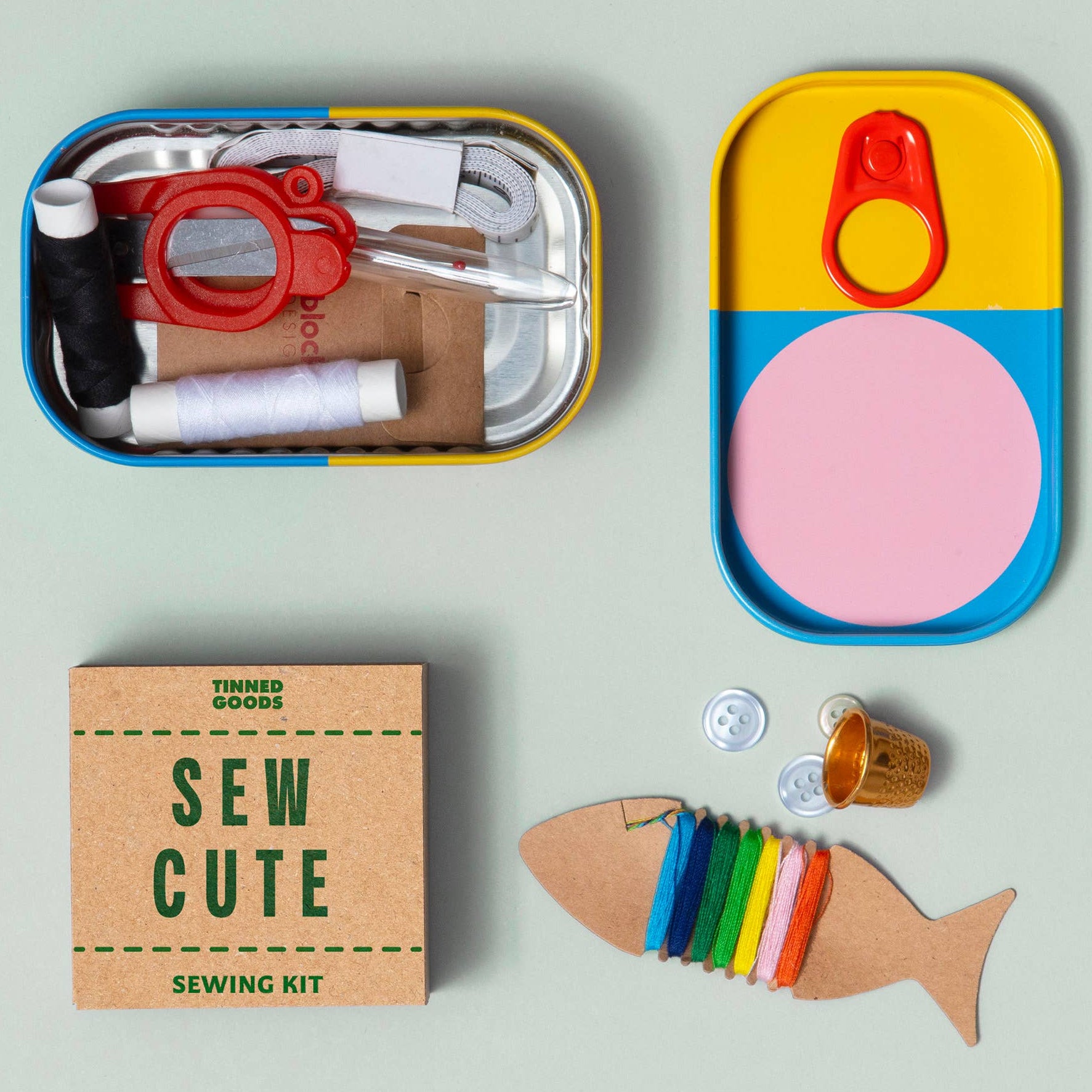 Sew Cute sewing kit with colorful components on a light gray background