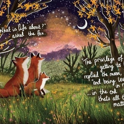A framed art print featuring an illustration of three foxes in a forest at night with handwritten quotes, displayed on a gray wall.