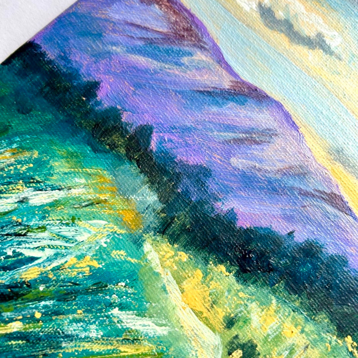 Abstract painting with a gradient of blue, purple, and green colors.