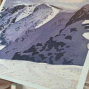 Close-up of a textured surface with a focus on a purple and white pattern.