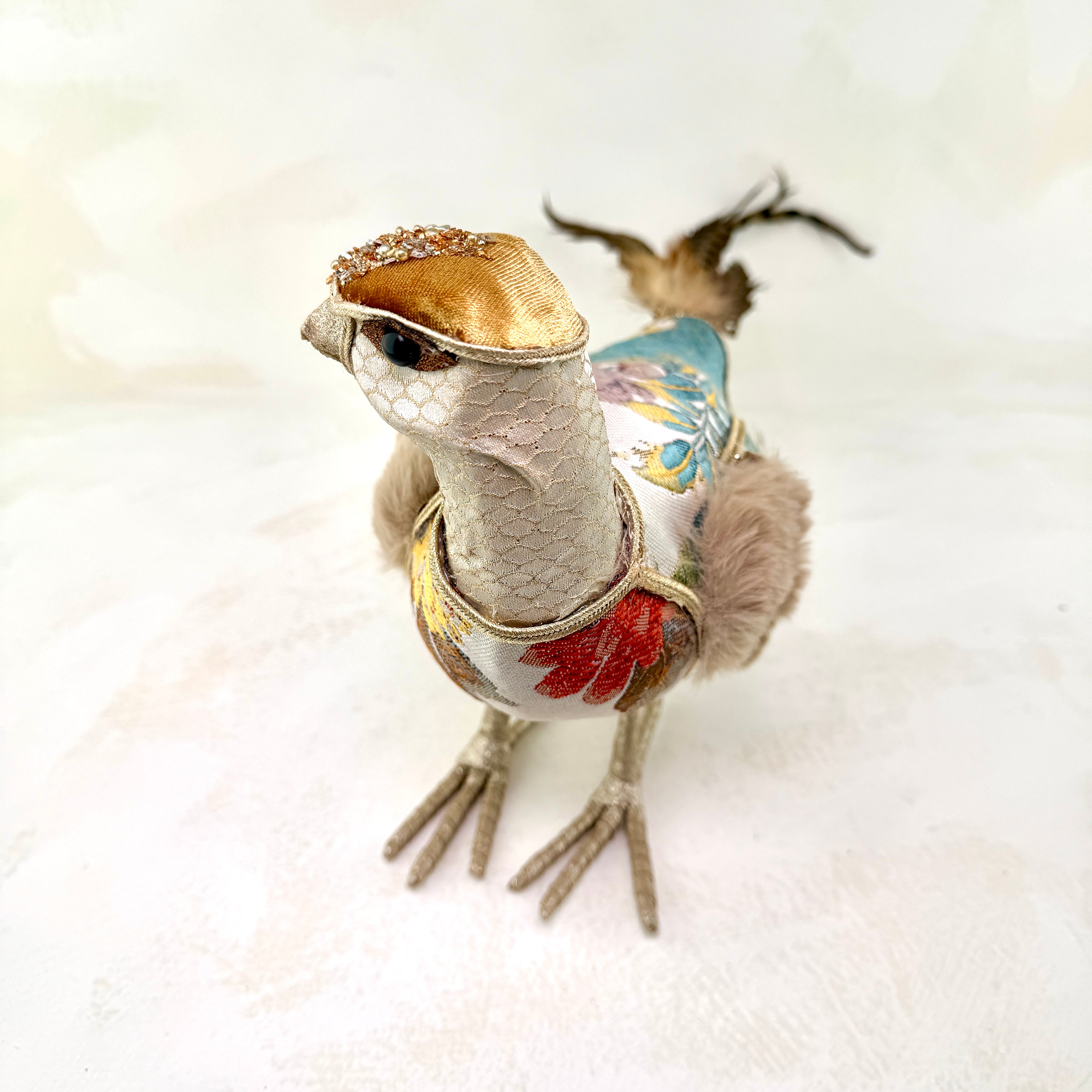 Embroidered white tapestry bird