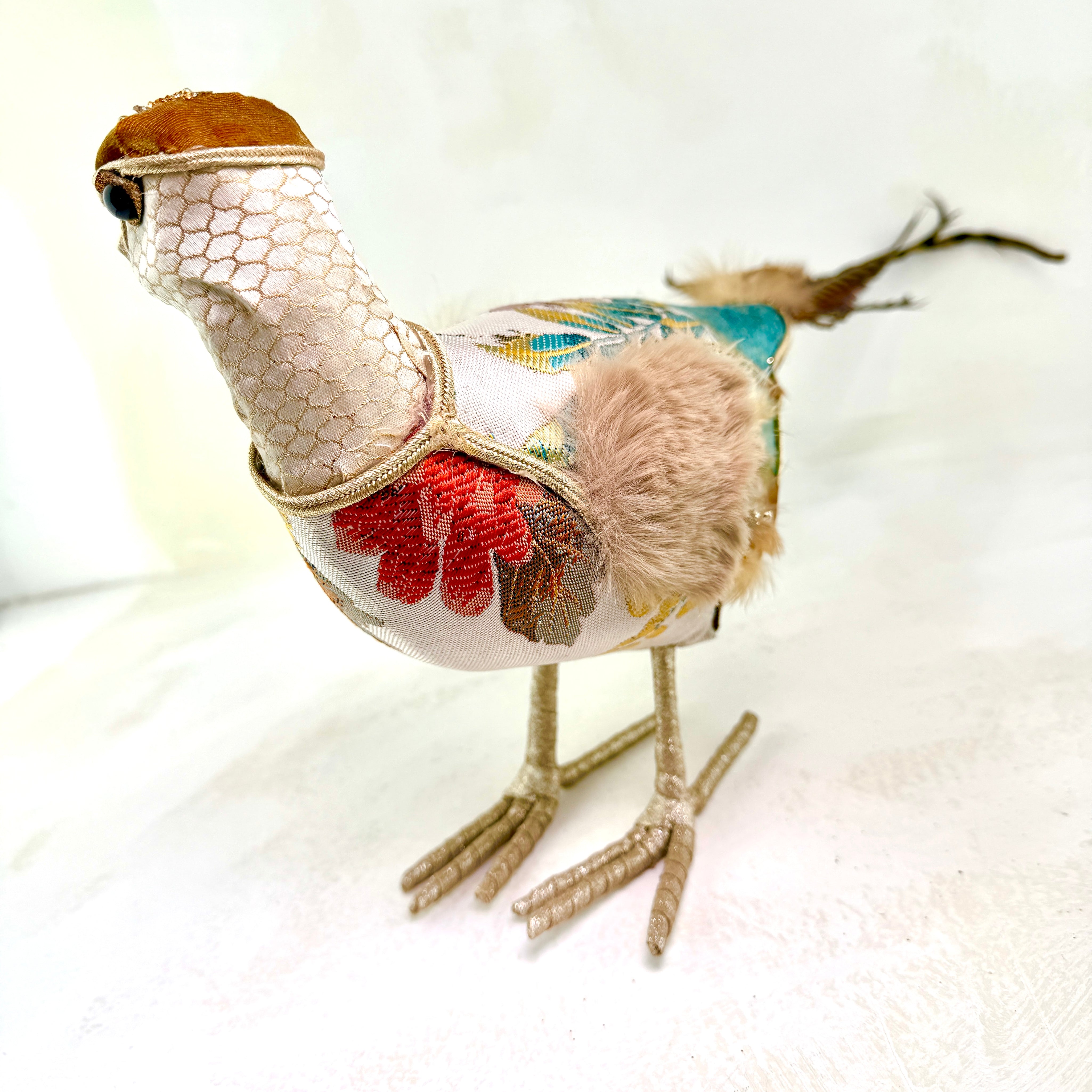 Embroidered white tapestry bird