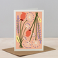 Greeting card with floral design on a plain background