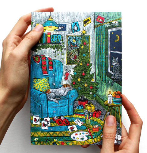 Illustrated greeting card of a cozy living room with Christmas decorations held by hands.