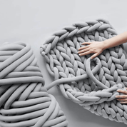 Knotty Potty Arm knitting -  a snuggle blanket