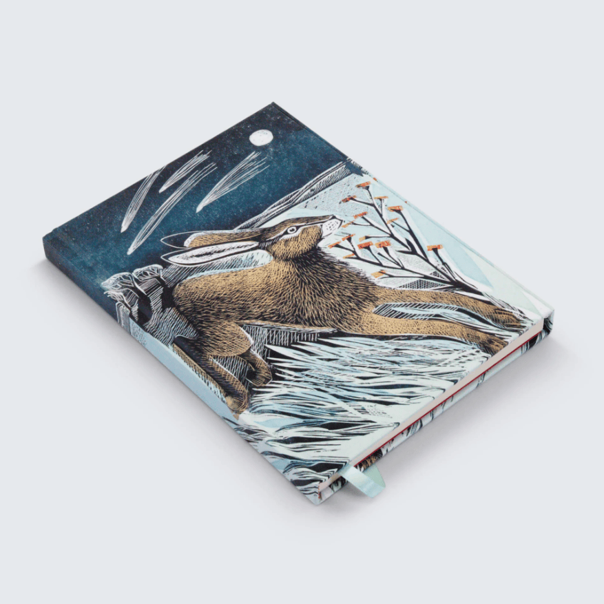 A product listing page for a Shooting Stars Hardback Foiled Journal on a Shopify website. The page shows a product image of a hardback journal with a colorful tiger and water illustration on the cover, 