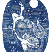 Artistic depiction of a mermaid and a woman sitting on a wave with celestial elements.