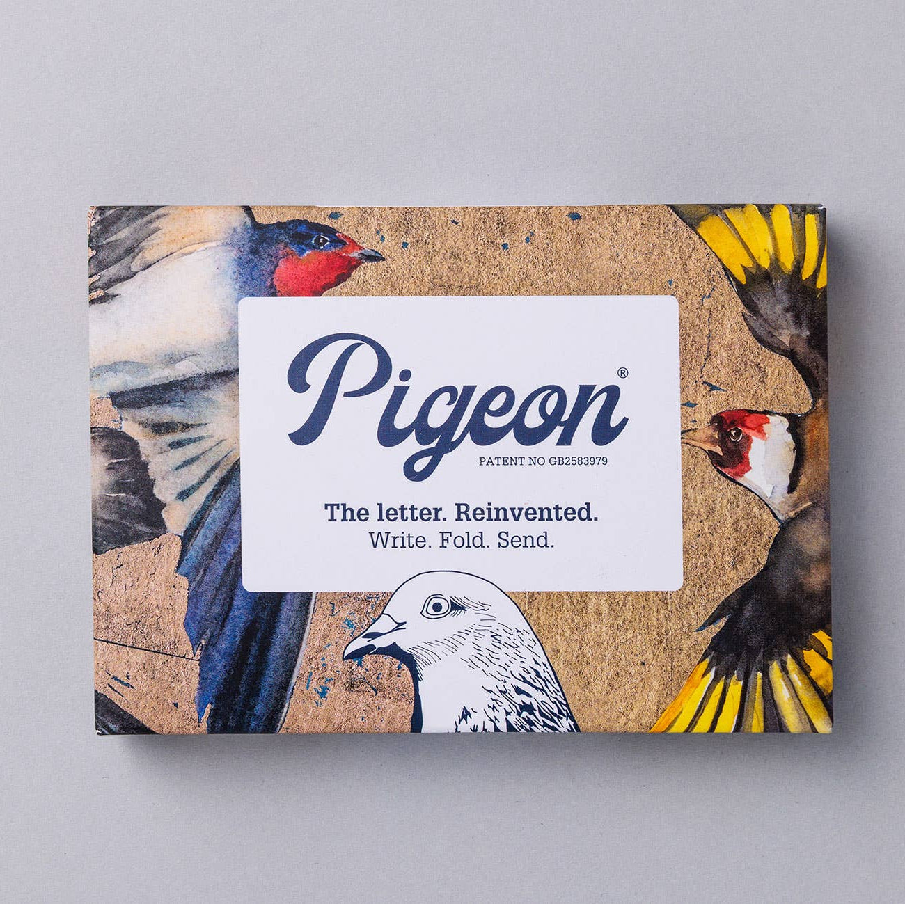 Pigeon letter writing set packaging with bird illustrations on a gray background