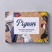 Pigeon letter writing set packaging with bird illustrations on a gray background
